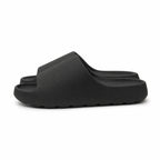 Black EVA platform slide slippers side view on white
