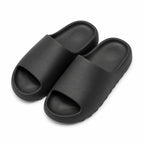 Black EVA platform slide slippers top view on white