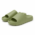 Green EVA platform slide slippers on a white background
