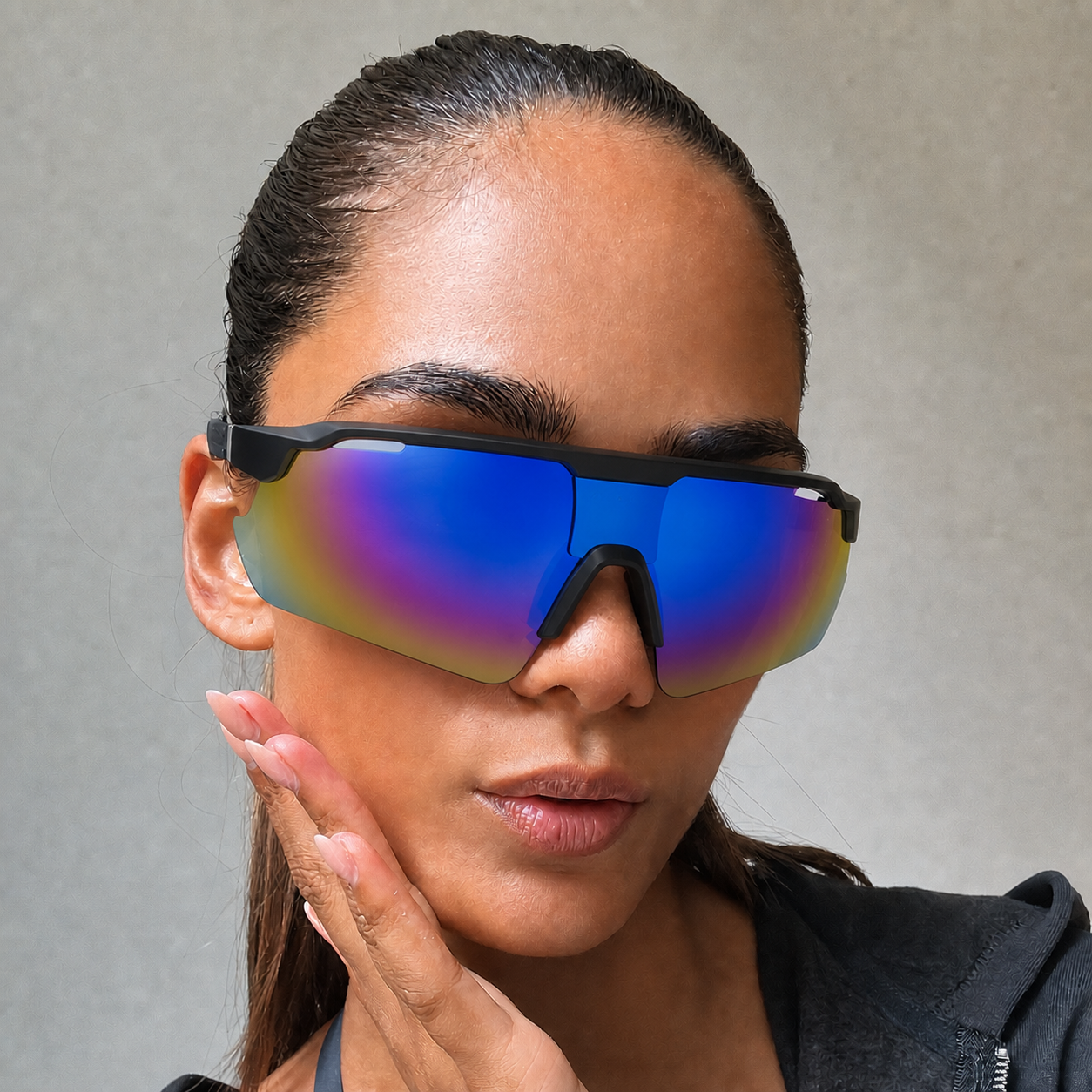 ACE Aurora mirrored polarized UV400 sports sunglasses worn in editorial portrait