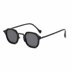 CAPRI polarized round browline sunglasses, black frame with black lens, diagonal view on pure white