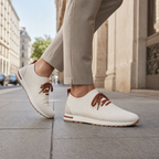 Men's beige knit sock-fit sneakers styled in the city