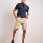 Men wearing Legacy beige cargo shorts