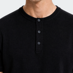 Black knit Henley collar and button placket detail