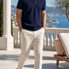 Men wearing white slip-on loafers at a resort