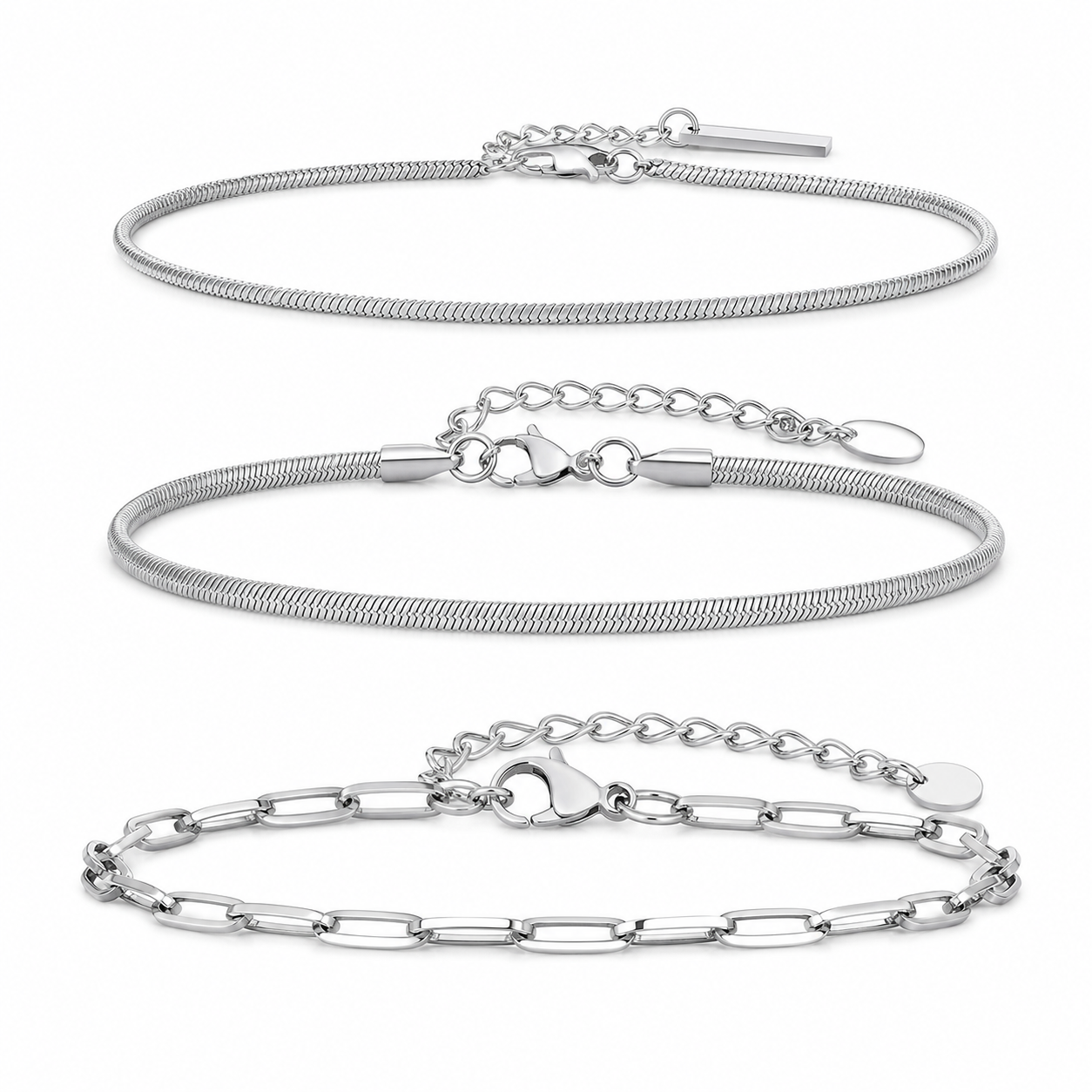 Three-piece silver stainless steel bracelet set, top-down studio view